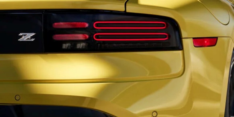 Rear view of yellow Nissan Z brake lights
